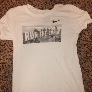 White Nike shirt ( run the empire)